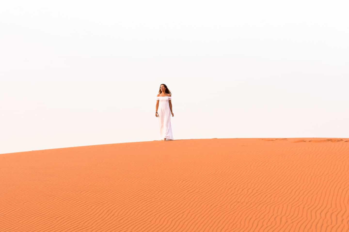 climbing the sand dunes at Merzouga