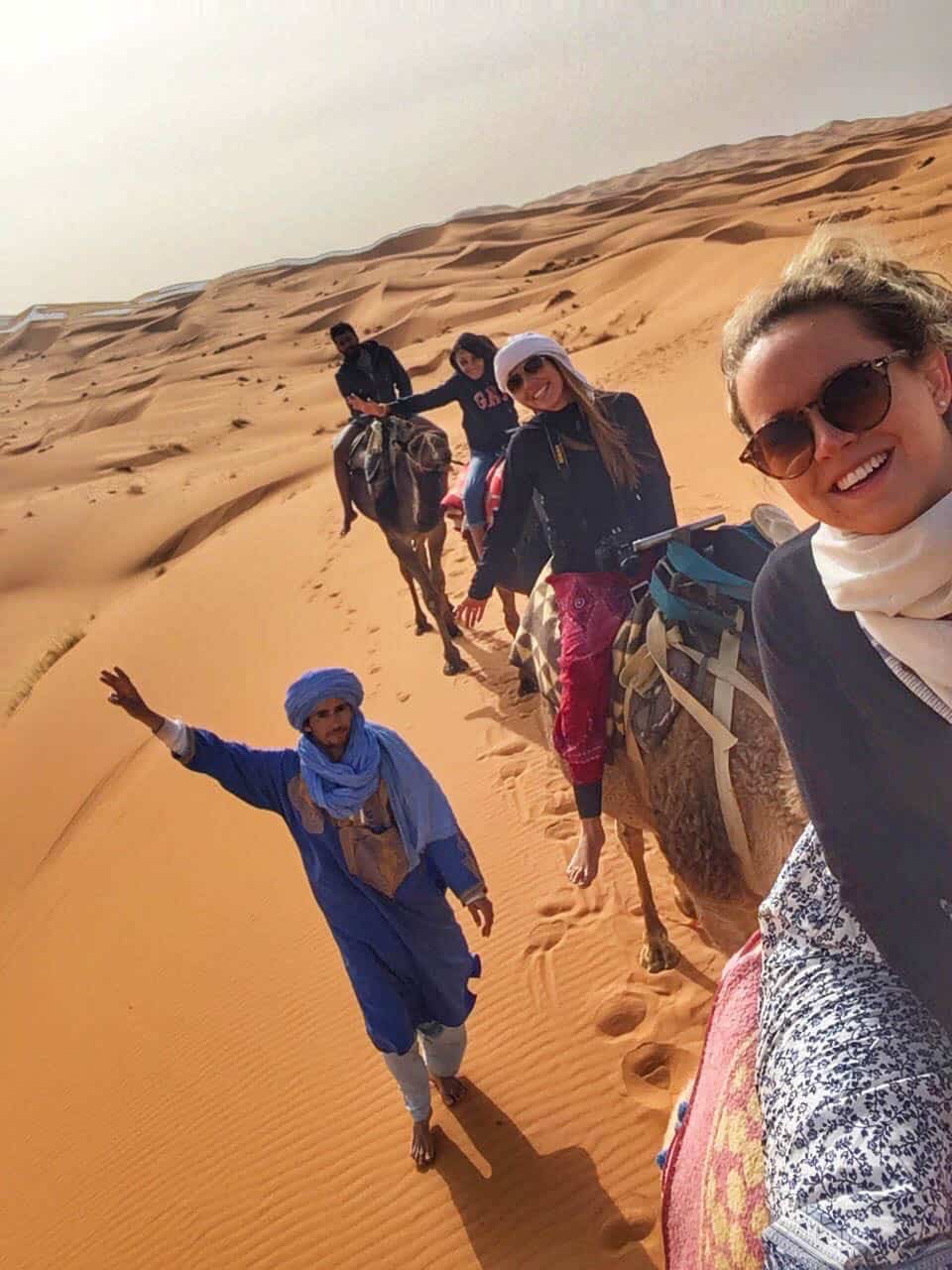 traversing the Sahara Desert by camel