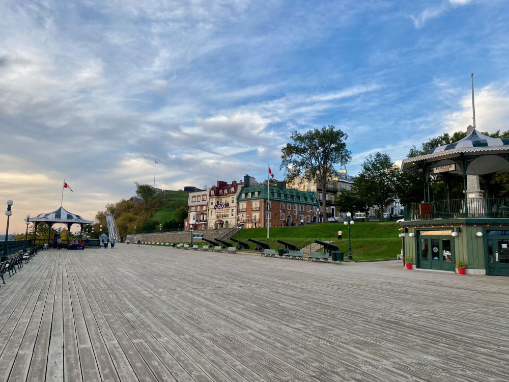 Dufferin Terrace, a wide, wooden boardwalk wrapping around the front of the Château Frontenac