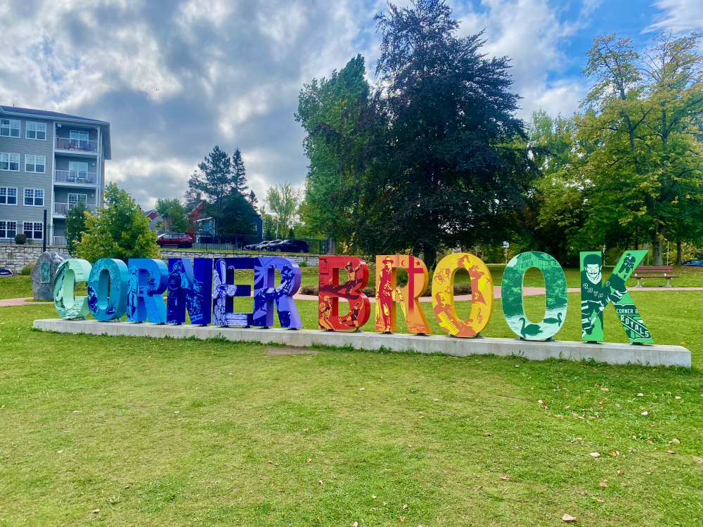 Giant Corner Brook sign, with several hiking routes starting just behind this