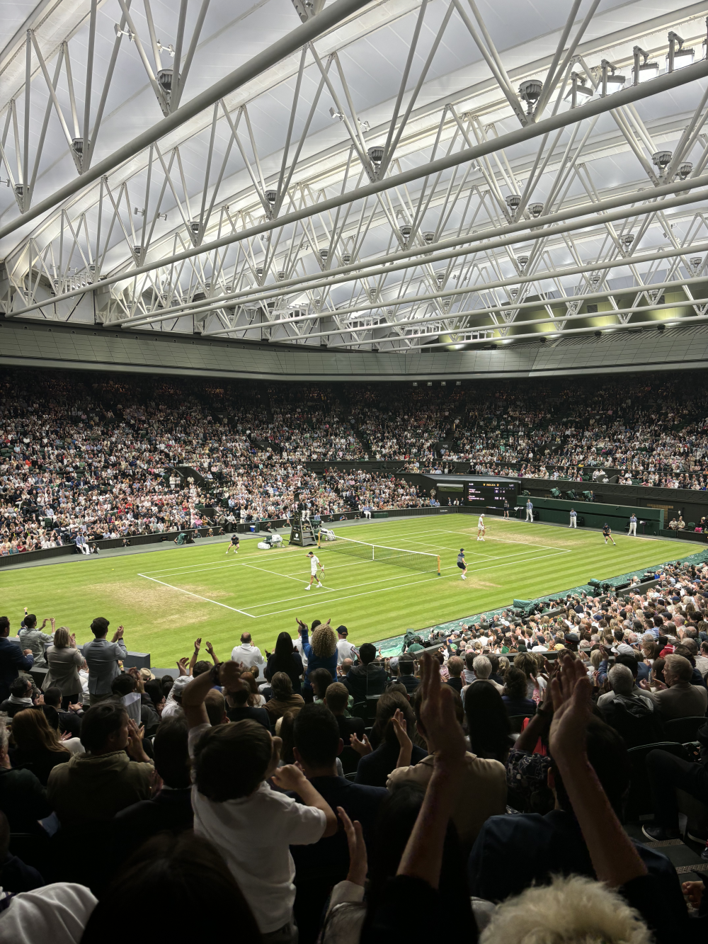 Enjoying the atmosphere on Centre Court at Wimbledon