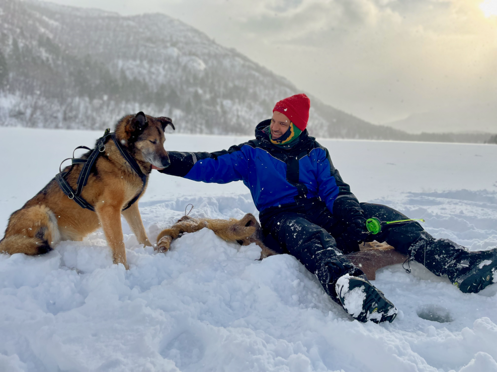 Greg with our new husky friend!