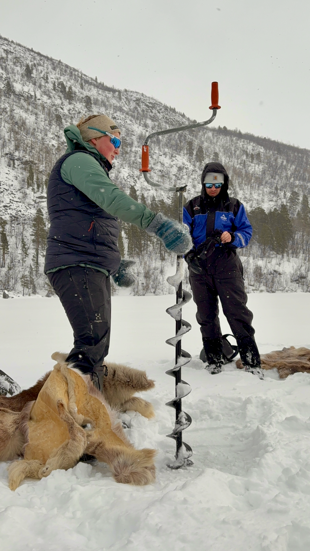 Snowshoeing and icefishing, two of the best activities to do on a winter arctic adventure in Alta, Norway