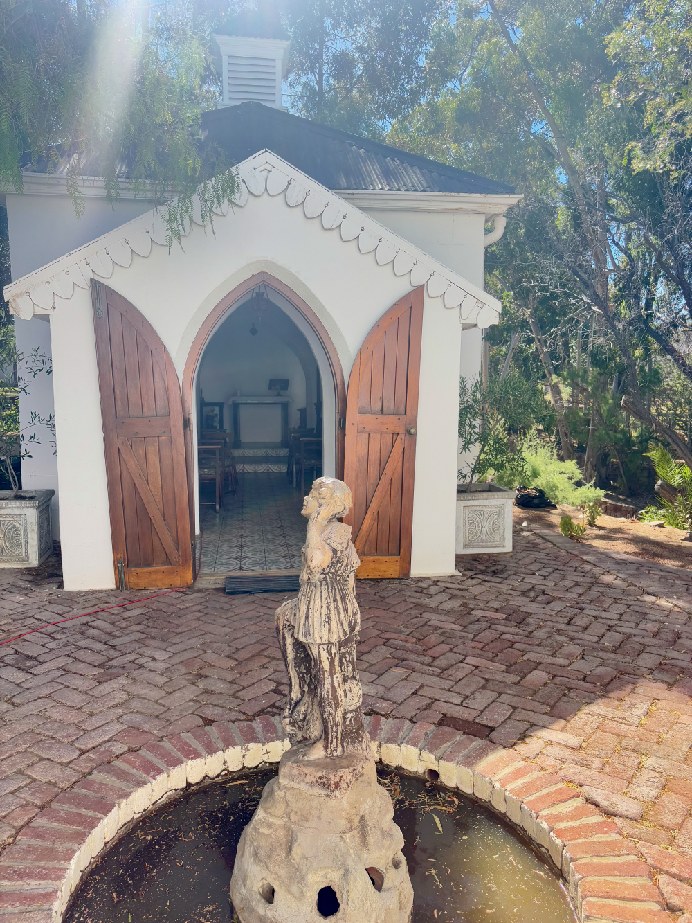 The Traveller's Chapel in the grounds of The Lord Milner Hotel