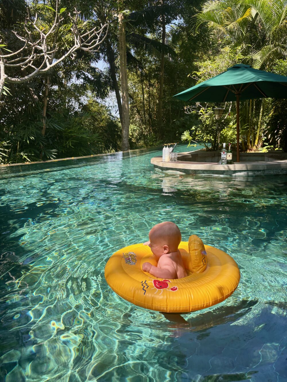 enjoying the pools and facilities at Arkamara Dijiwa