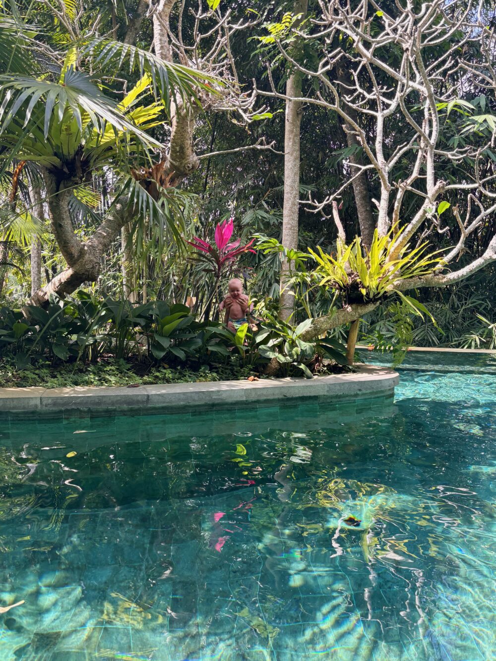 enjoying the pools and facilities at Arkamara Dijiwa