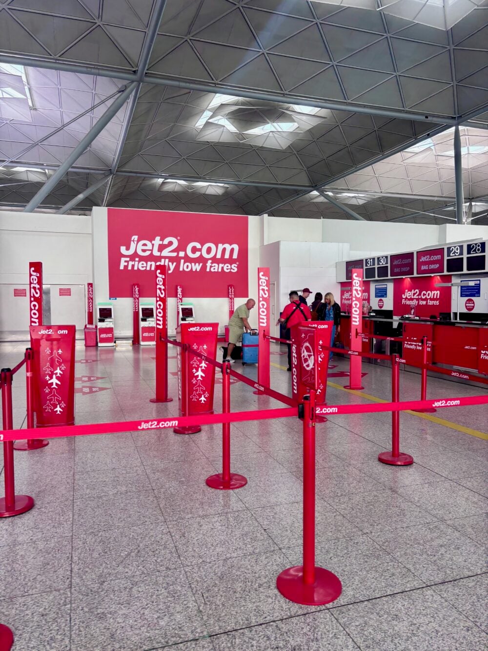 check in at Jet2 area at London Stansted Airport