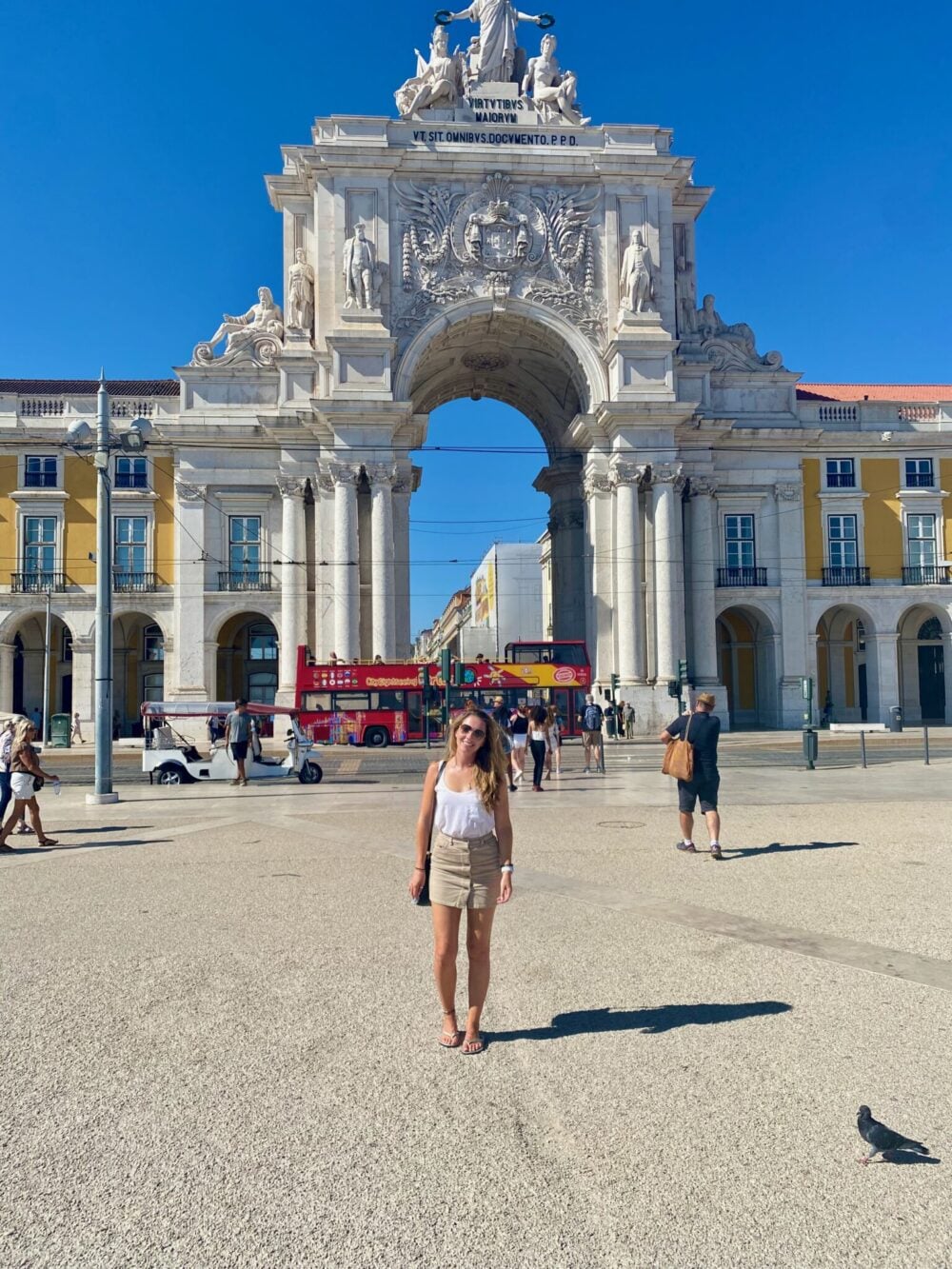 Standing in front of the Arco da Rua Augusta, a top thing to do in Lisbon