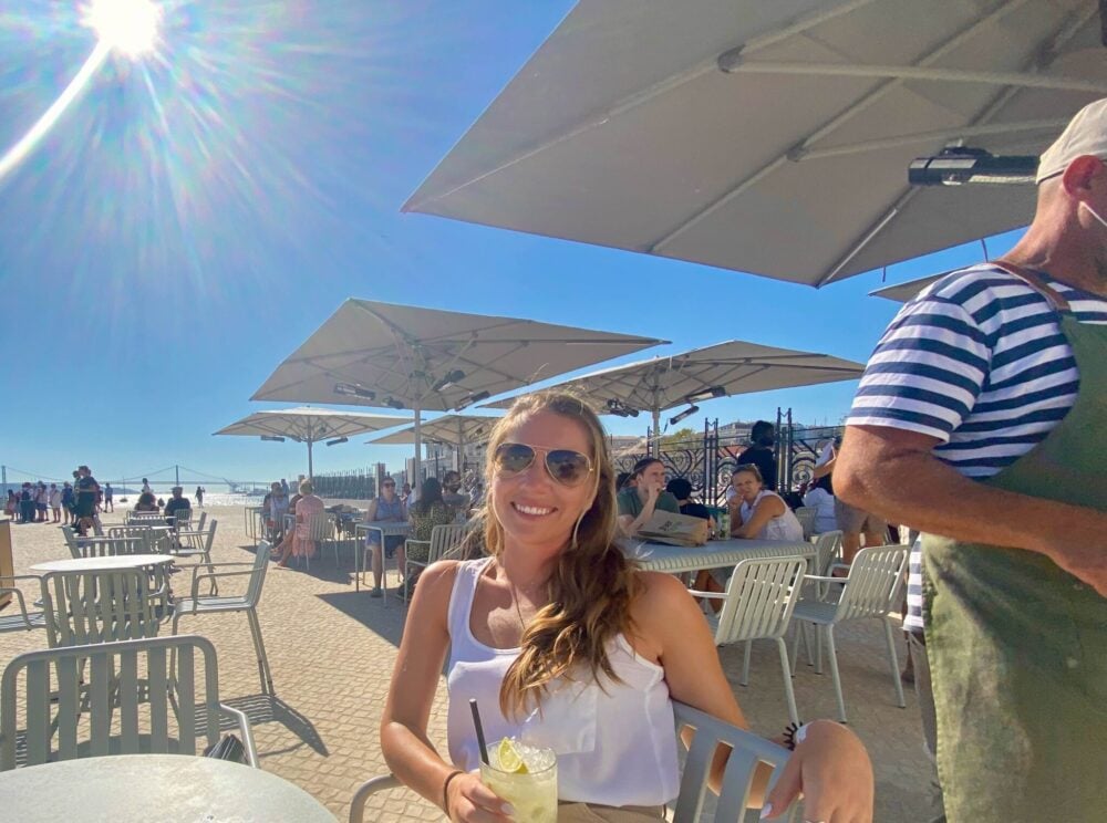Enjoying a drink on a sunny terrace in Lisbon
