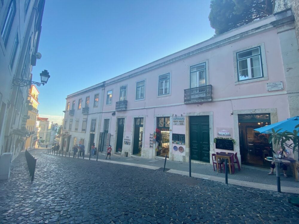 White buildings on a quiet street in Lisbon